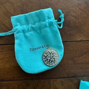 Tiffany & Co. Turquoise Drawstring Pouch with Silver Round Logo Charm